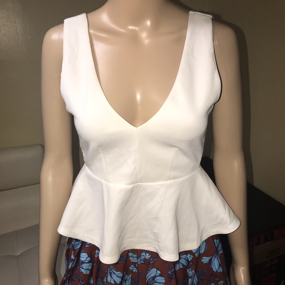 White peplum top